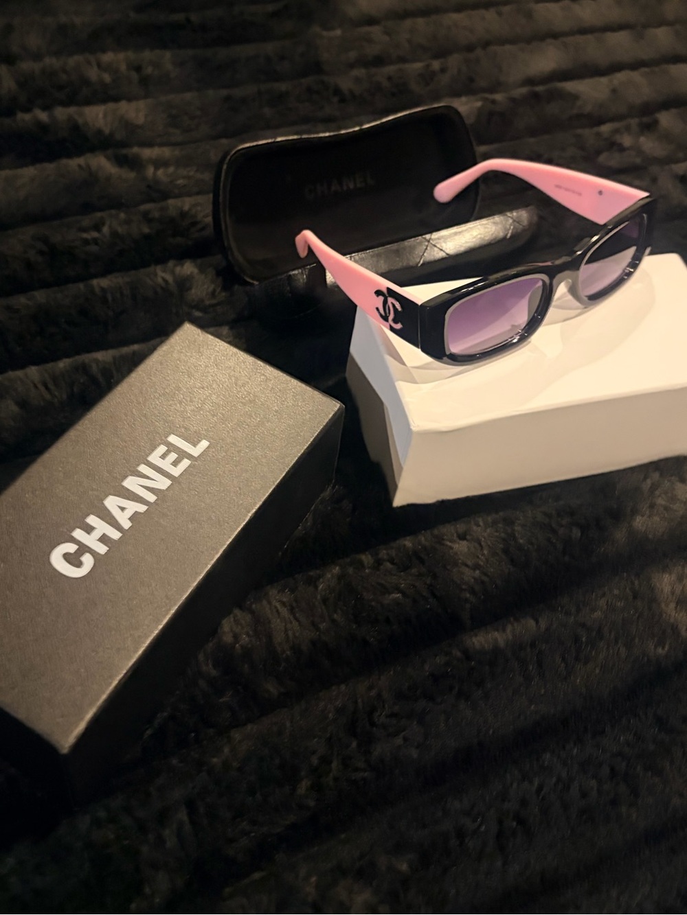 CHANEL Black Frame Sunglasses with Pink Temples and Purple Lenses
